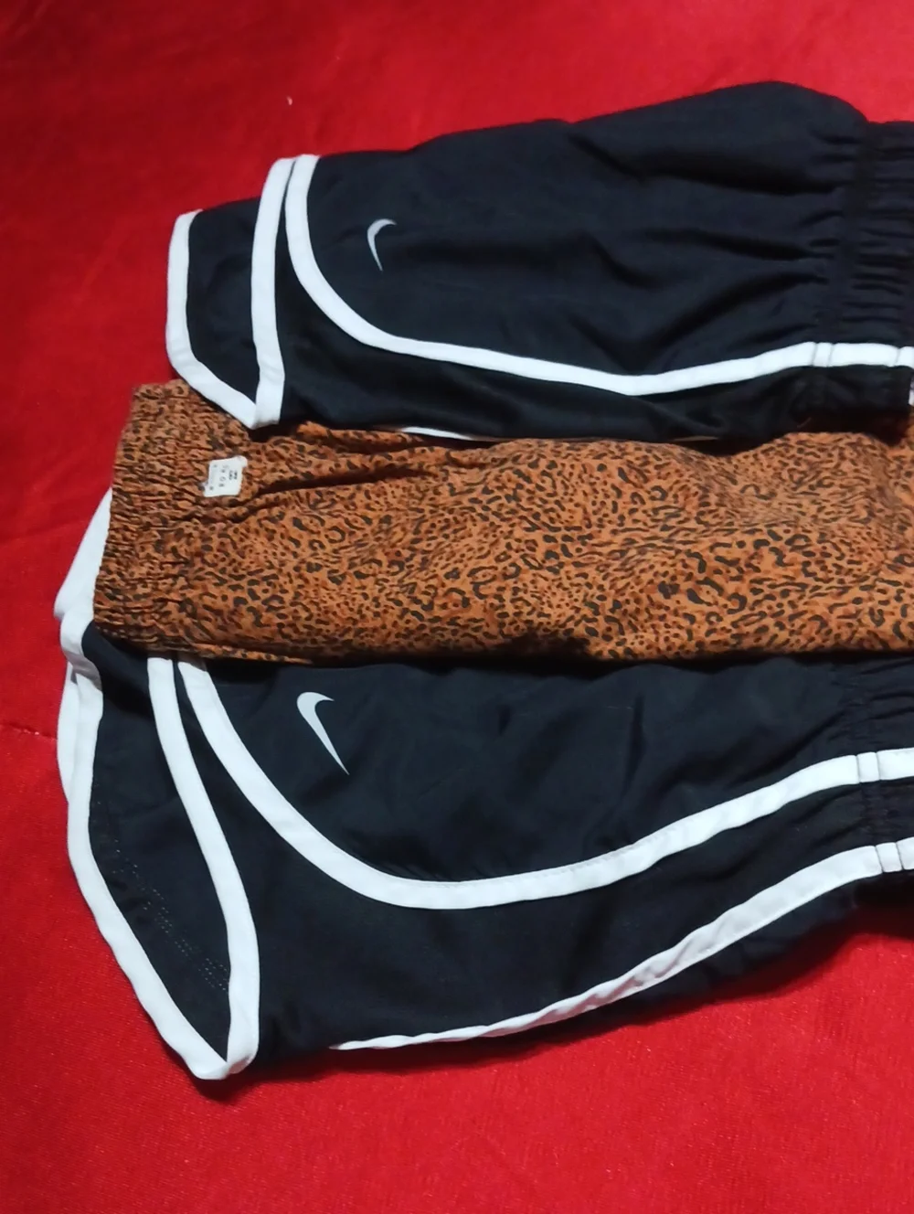 Nike Kids Black Shorts with White Trim and Brown Leopard Print Pair